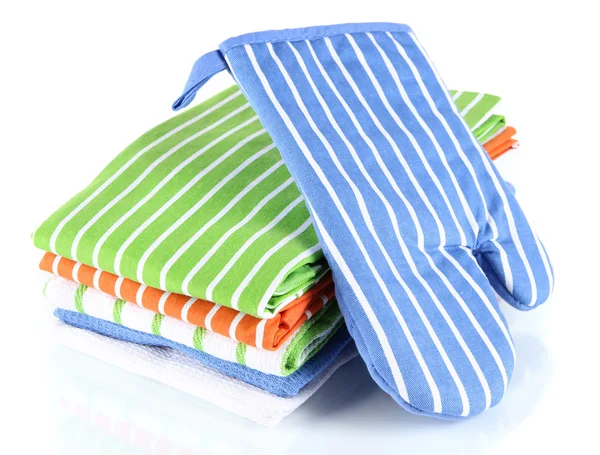 Blue potholder and stack of kitchen towels isolated on white — Stock Photo, Image