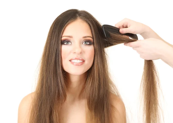 Vrouw met lange haren in de schoonheidssalon, geïsoleerd op wit — Stockfoto