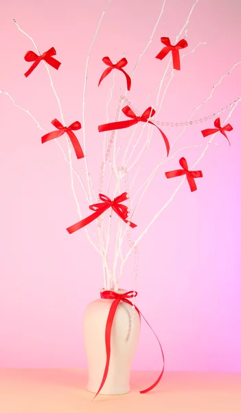 Composition from bows on pink background — Stock Photo, Image