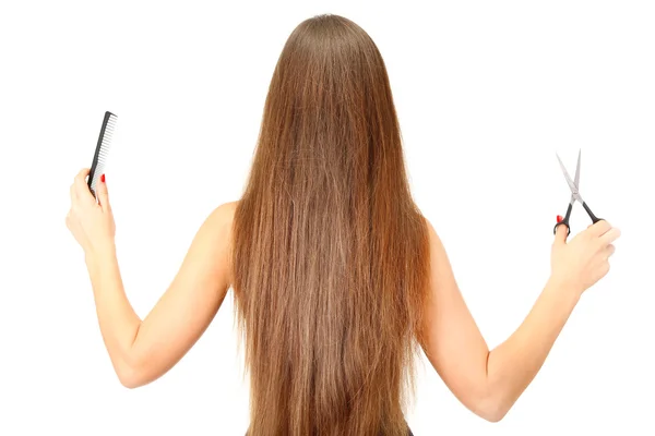 Belle femme aux cheveux longs et aux outils de coiffeur, isolée sur blanc — Photo