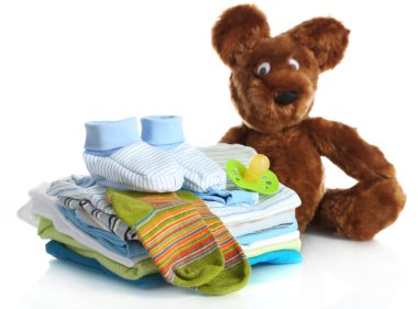 beyaz izole bebek elbise yığını