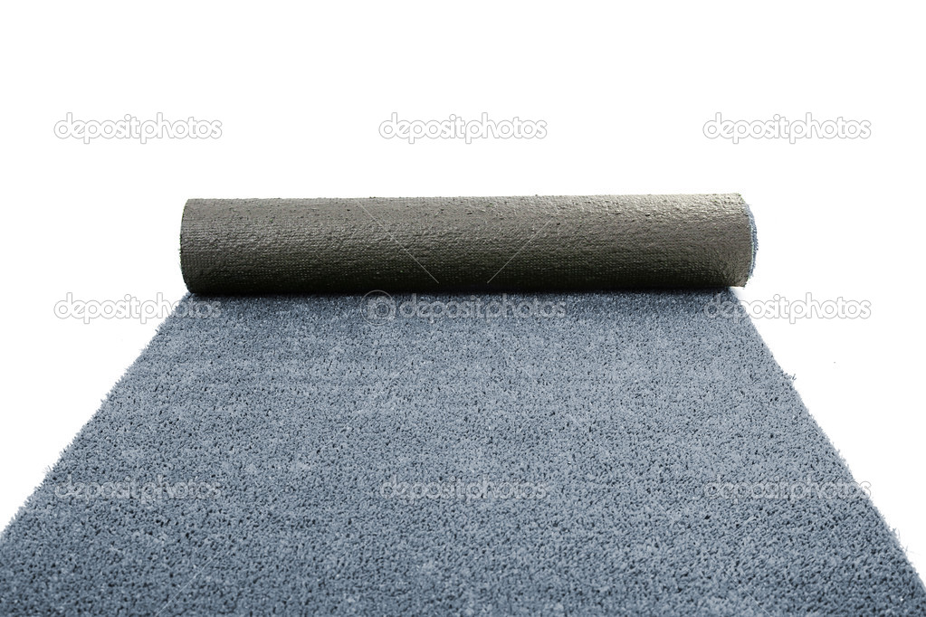 Artificial rolled grey grass isolated on white