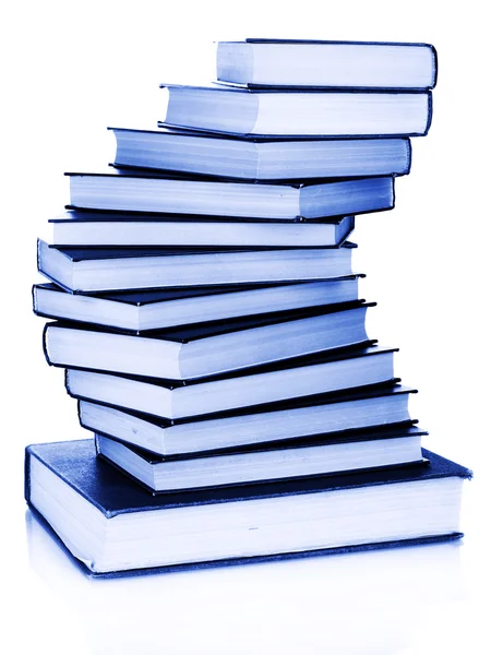 Stack of books in blue light — Stock Photo, Image