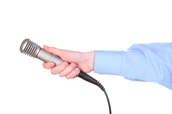 Erkek el ile üzerine beyaz izole mikrofon — Stok fotoğraf