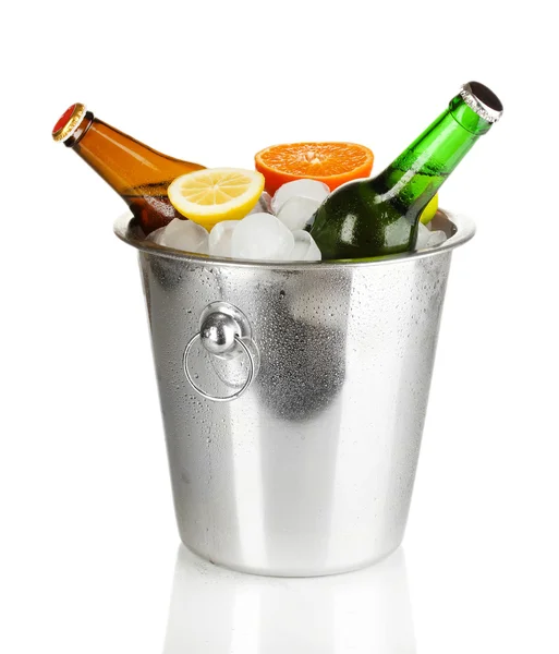 Beer bottles in ice bucket isolated on white — Stock Photo, Image