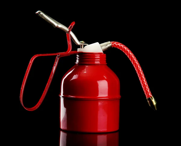 Oil can on black background — Stock Photo, Image