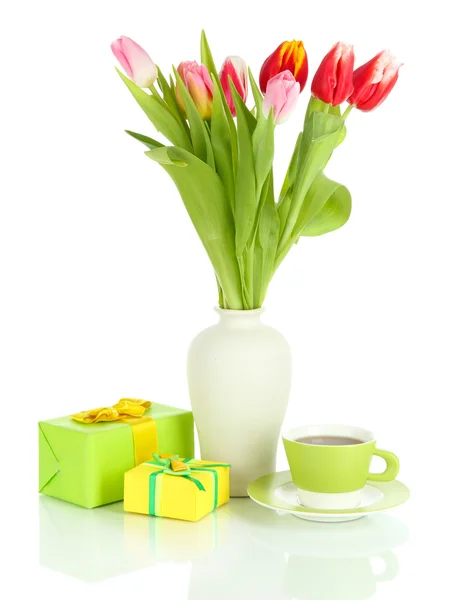 Beautiful tulips in bucket with gifts and cup of tea isolated on white — Stock Photo, Image