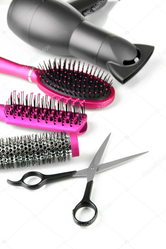 Comb brushes, hairdryer and cutting shears, isolated on white — Stock