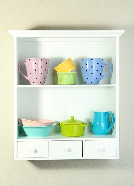 Kitchen utensils on beautiful white shelves — Stock Photo, Image