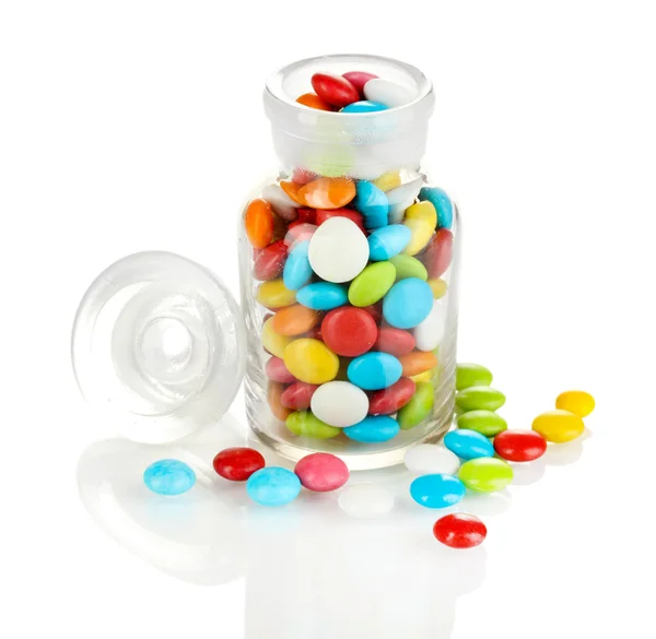 Colorful candies in glass jar isolated on white Stock Image