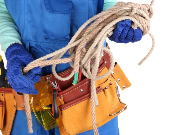 Constructeur masculin en salopette bleue avec corde isolée sur blanc — Photo