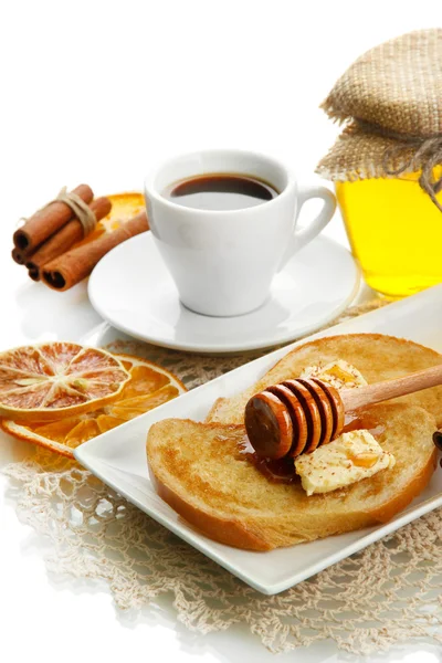 Wit brood toast met honing en kopje koffie, geïsoleerd op wit — Stockfoto