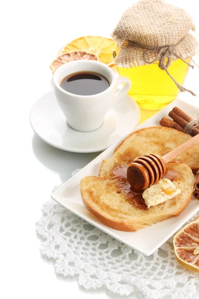 Torrada de pão branco com mel e xícara de café, isolada em branco — Fotografia de Stock