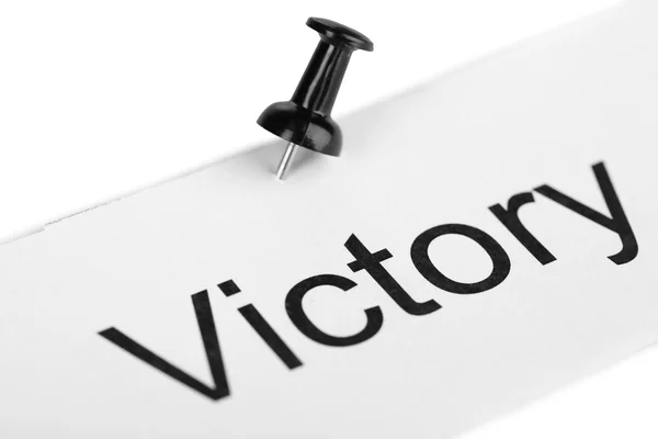 Push pin on paper with word victory written on it isolated on white — Stock Photo, Image