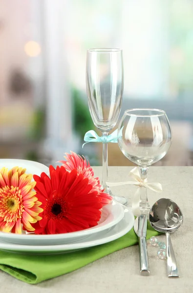 Table serving on bright background — Stock Photo, Image