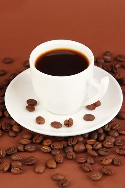 Cup of strong coffee on brown background — Stock Photo, Image