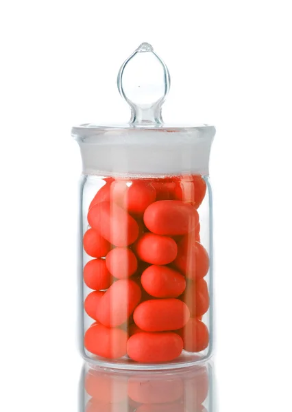 Transparent bottle with pills isolated on white — Stock Photo, Image