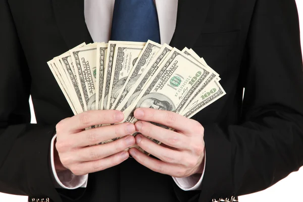 Business man holds lot of money isolated on white — Stock Photo, Image