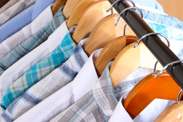 Men's shirts on hangers close-up — Stock Photo, Image