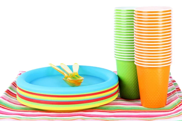 Tazze, cucchiai e forchette, di diversi colori su sfondo brillante — Foto Stock