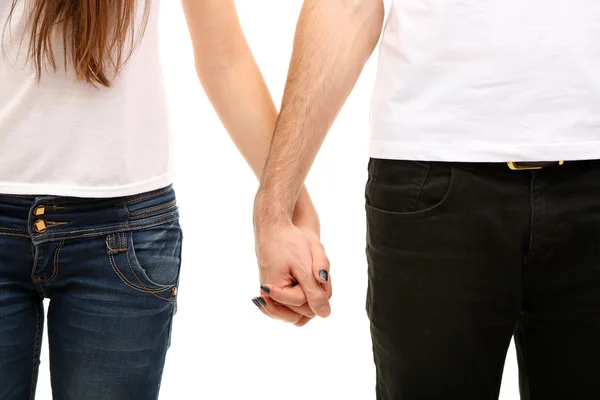 Unga älskande par hålla händer isolerad på vit — Stockfoto