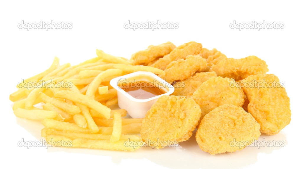 Fried chicken nuggets with french fries and sauce isolated on white