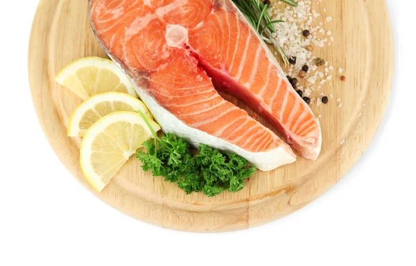 Fresh salmon steak on cutting board, isolated on white — Stock Photo, Image