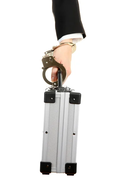 Hand with handcuff and suitcase, isolated on white — Stock Photo, Image