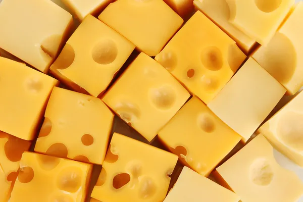 Cubos de queijo fundo — Fotografia de Stock