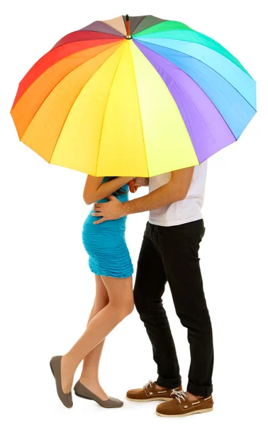 Loving couple standing with umbrella isolated on white — Stock Photo, Image