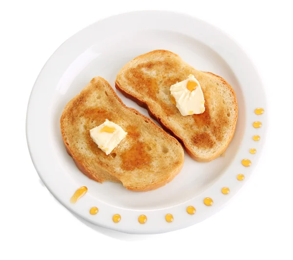 Pan blanco tostado con miel en plato, aislado sobre blanco —  Fotos de Stock
