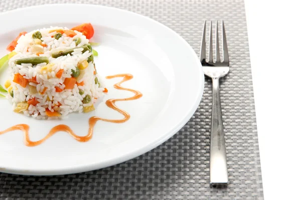 Delicious risotto with vegetables, isolated on white — Stock Photo, Image