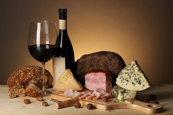Exquisite still life of wine, cheese and meat products