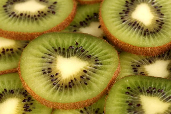 Kiwi slices background — Stock Photo, Image