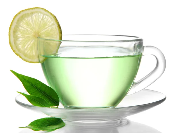 Průhledný šálek zeleného čaje s citronem, izolované na bílém — Stock fotografie