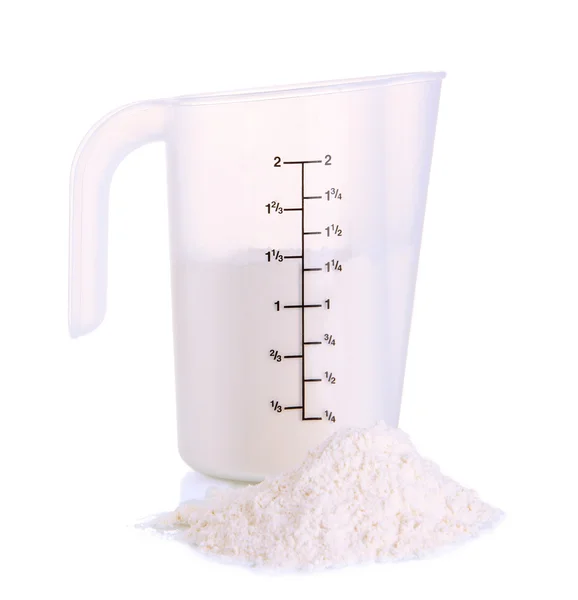 Measuring cup with flour isolated on white — Stock Photo, Image