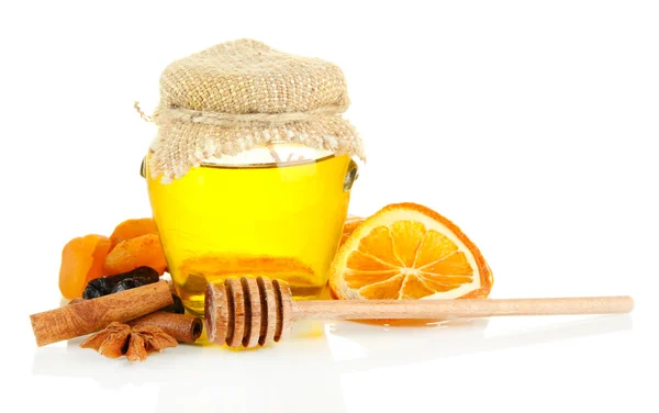 Tarro de miel y frutos secos aislados en blanco — Foto de Stock