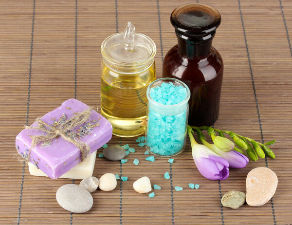 Beautiful spa setting on bamboo table close-up