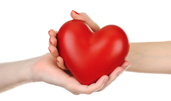 Red heart in woman and man hands, isolated on white — Stock Photo, Image