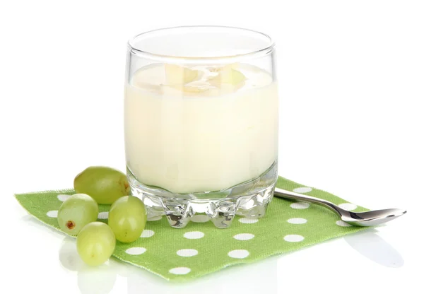 Delicious yogurt in glass with grapes isolated on white — Stock Photo, Image