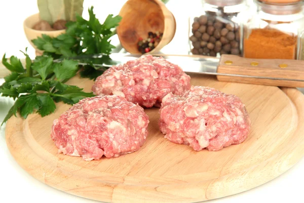 Raw meatballs with spices — Stock Photo, Image