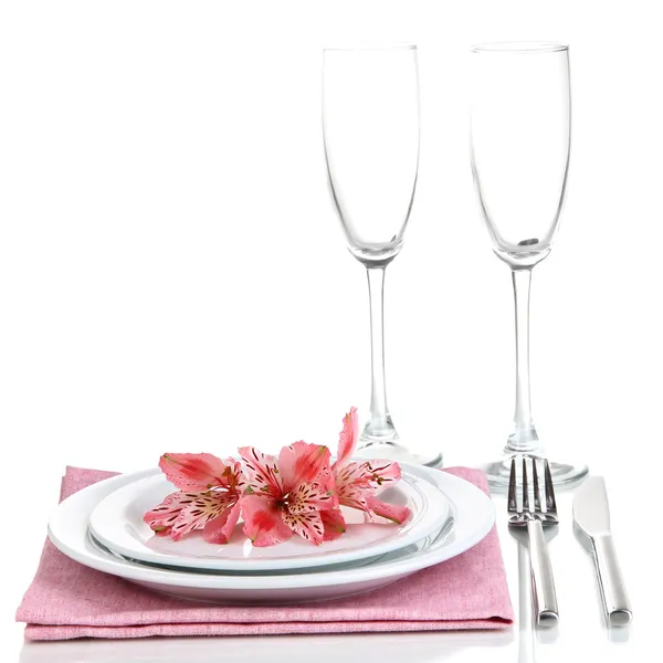 Festive table setting with flowers isolated on white — Stock Photo, Image