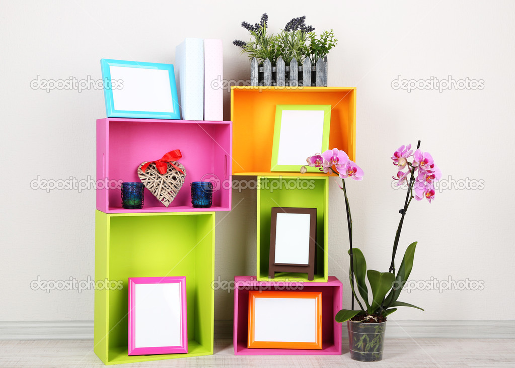 Beautiful colorful shelves with different home related objects