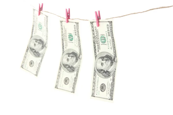 Paper money on rope isolated on white — Stock Photo, Image