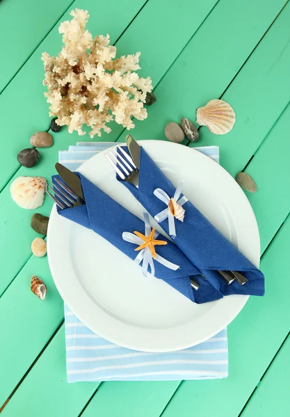 Marine table setting on color wooden background — Stock Photo, Image