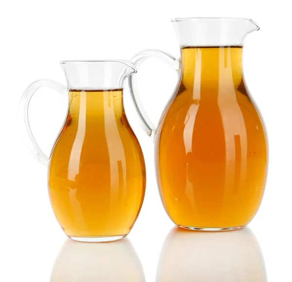 Apple juice in pitchers isolated on white — Stock Photo, Image