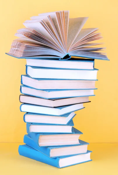 Spiral books on beige background — Stock Photo, Image