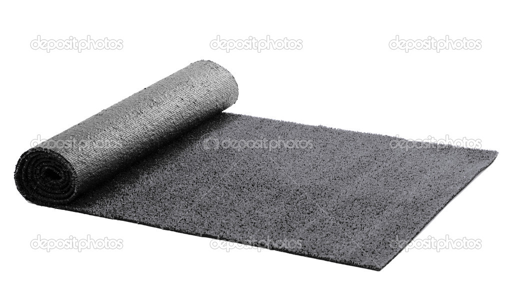 Artificial rolled black grass isolated on white