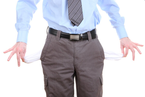 Business man showing his empty pockets, isolated on white