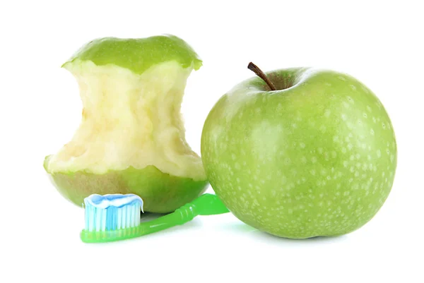 Jabłka z szczoteczkę do zębów na białym tle — Zdjęcie stockowe